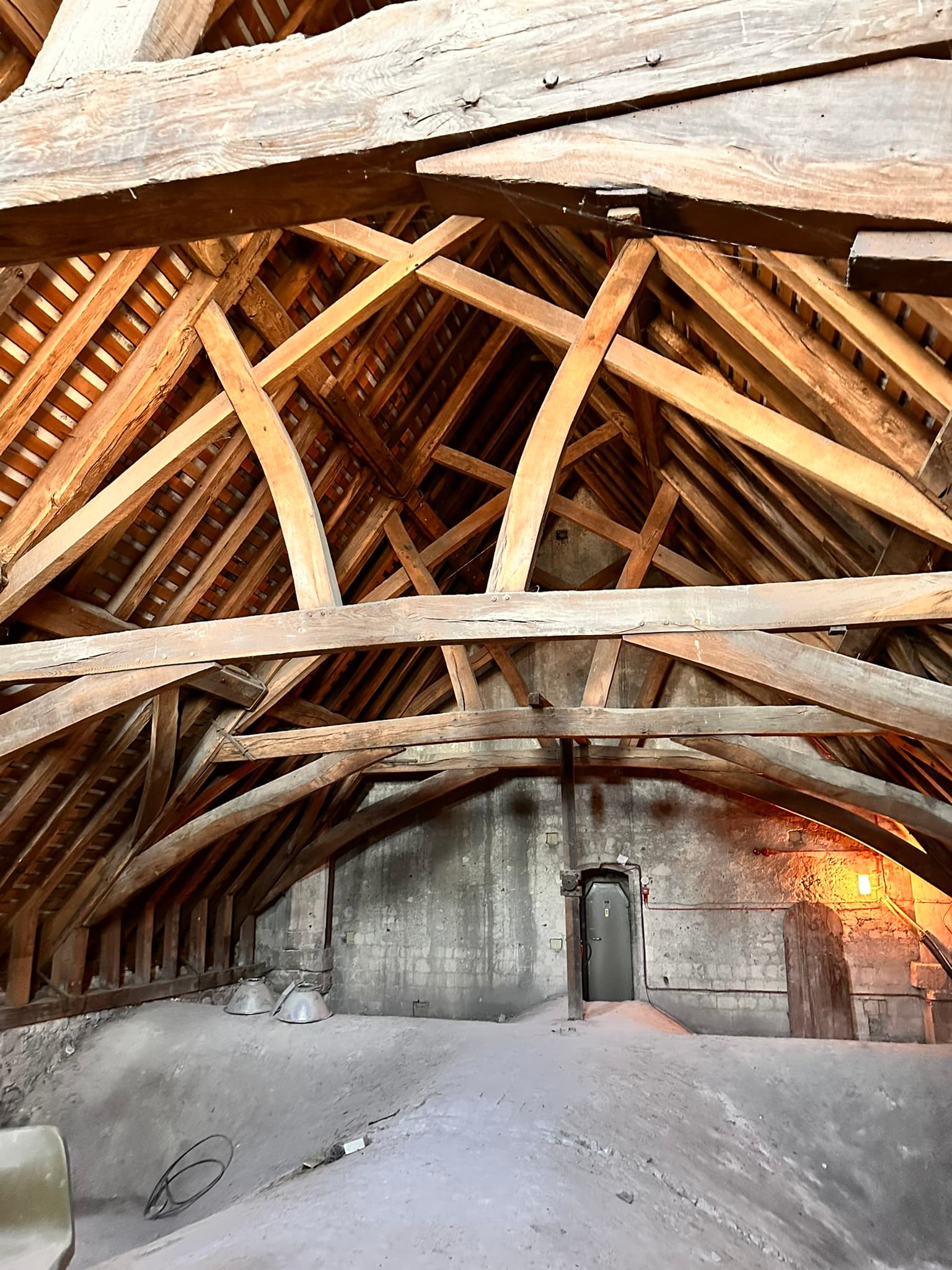Curved timber roof trusses of a traditional building